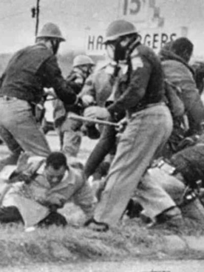John Lewis being beaten by state troopers during Selma march