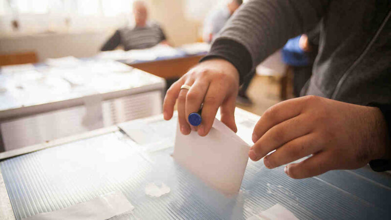 voter at the ballot box
