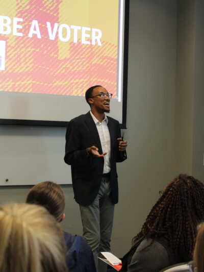 staff presenting at event