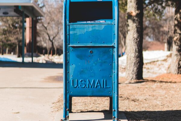 A picture of a blue mailbox. Photo taken by Alex Perz.