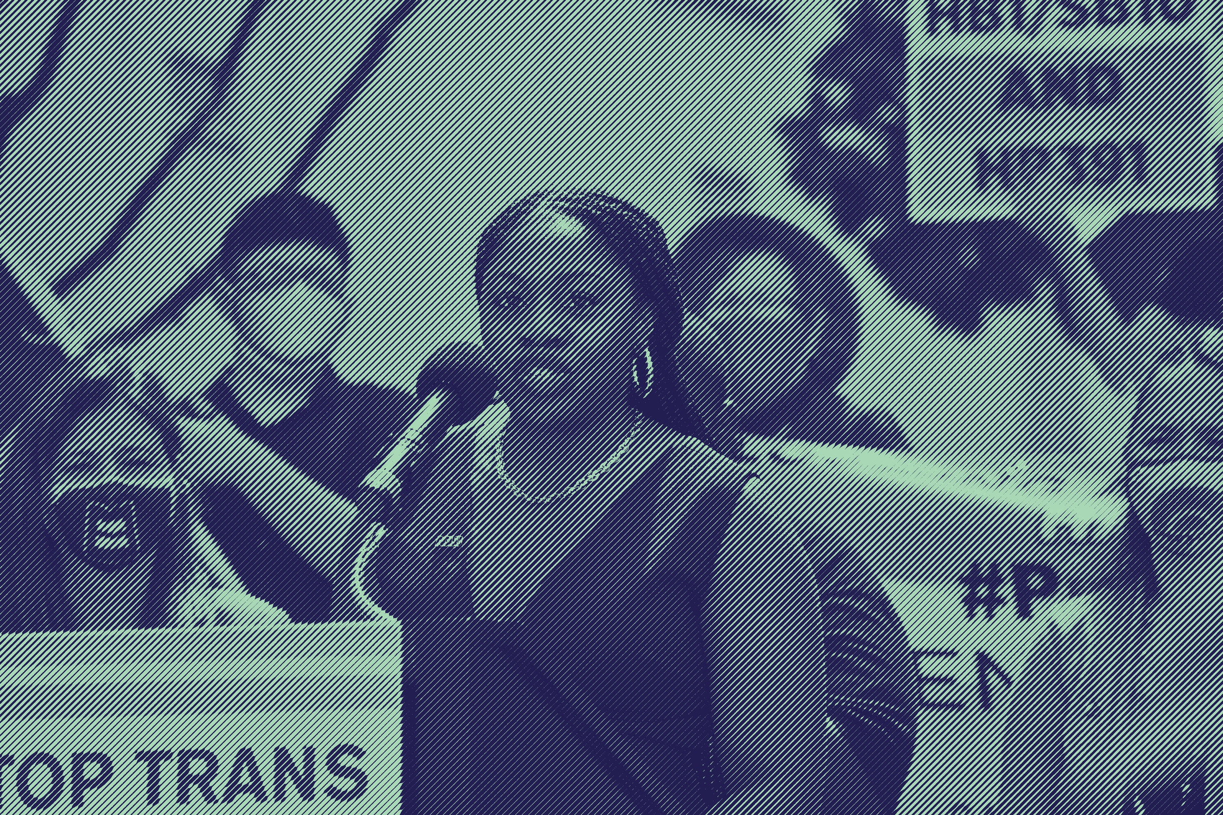 A photo of Executive Director JaTaune Bosby at a rally. Taken by Jill Friedman.