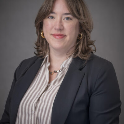 headshot of woman in suit