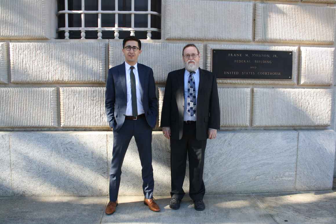 lawyers outside of courthouse