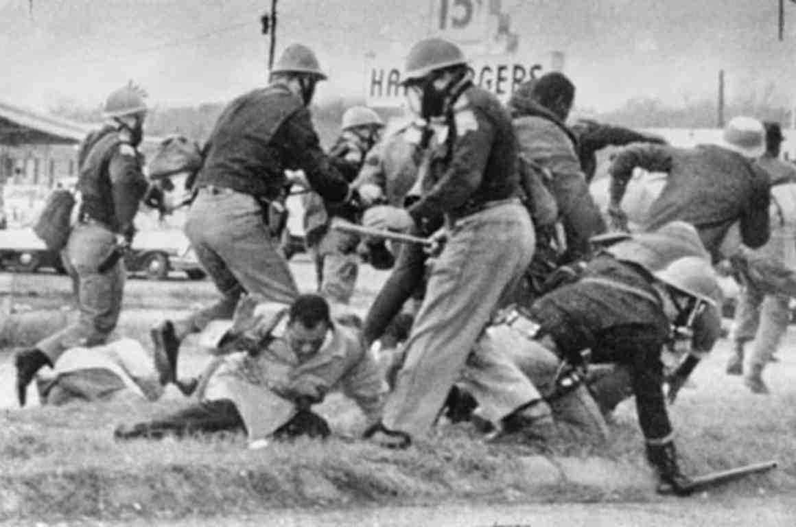 John Lewis being beaten by state troopers during Selma march