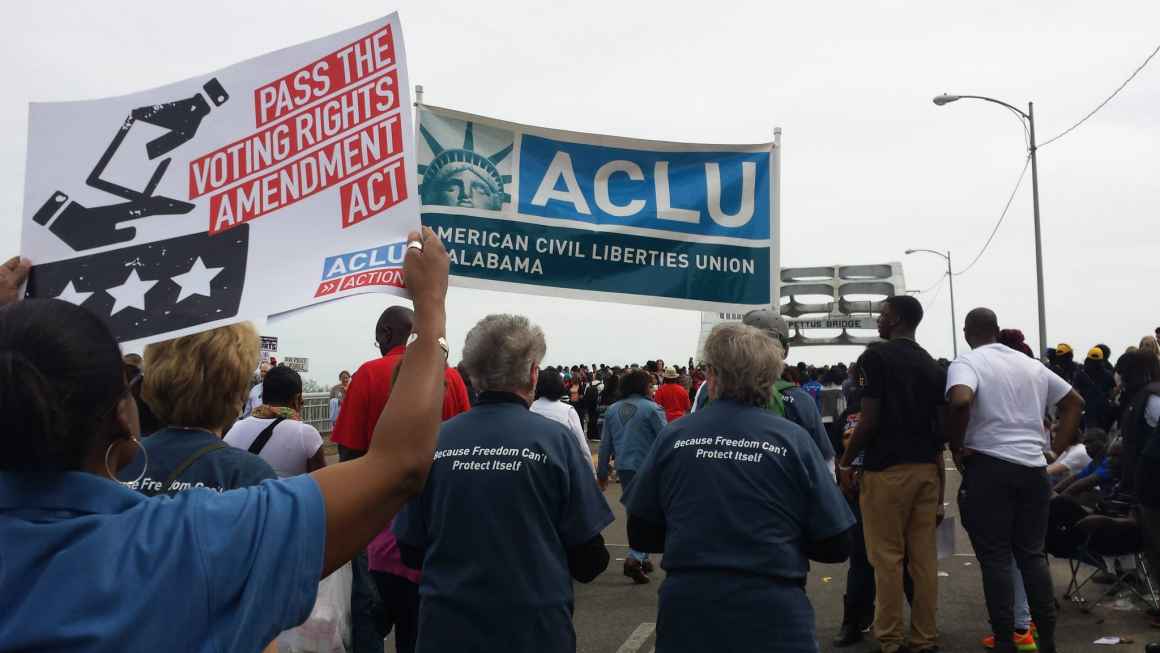 Supporters marching on Edmund Pettus Bridge for the 50th Anniversary of the March on Selma