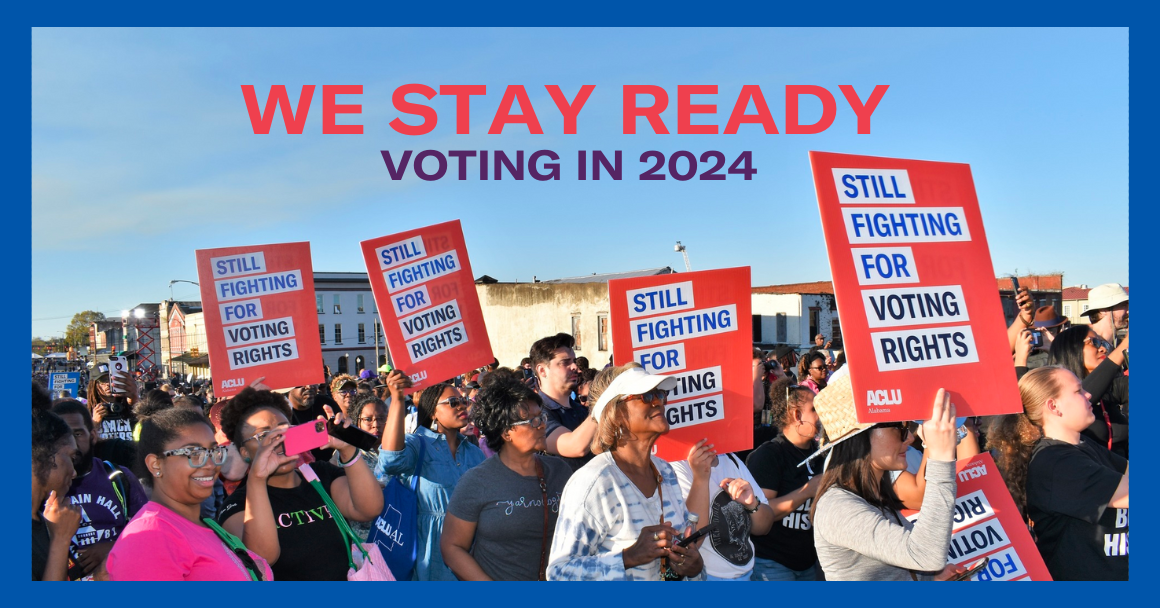 People holding voting rights signs in Selma