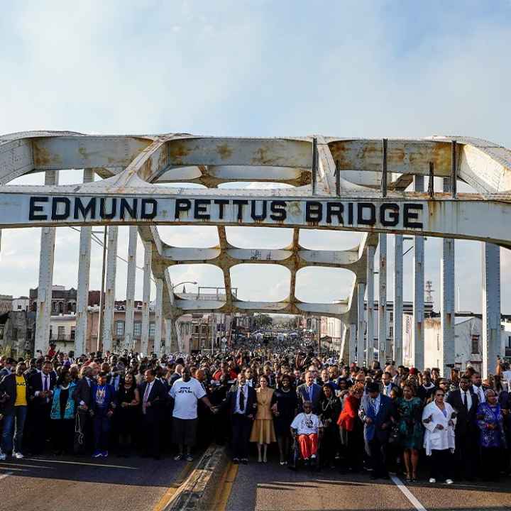 Demonstrators including Vice President Kamala Harris march on the Edmund Pettus Bridge on the anniversary of "Bloody Sunday" on Sunday, March 6, 2022.