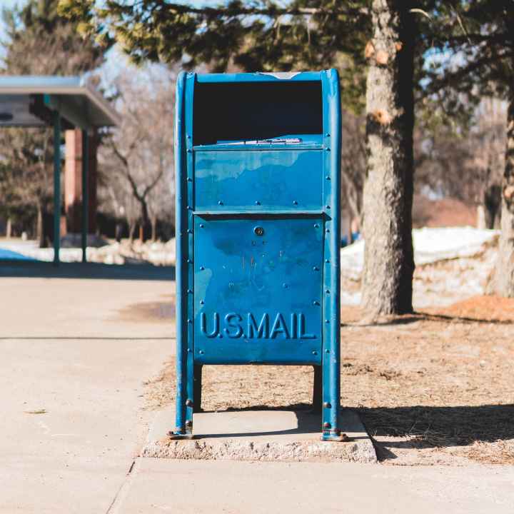 A picture of a blue mailbox. Photo taken by Alex Perz.
