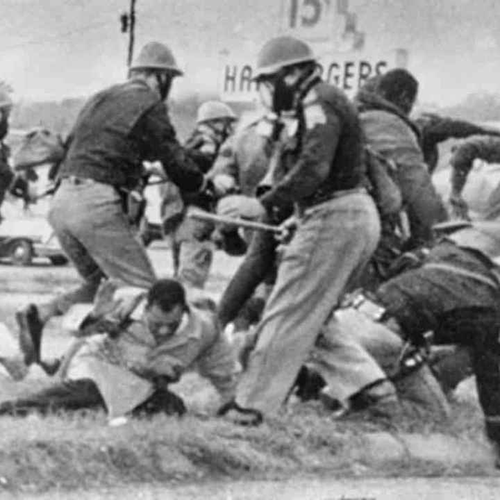 John Lewis being beaten by state troopers during Selma march